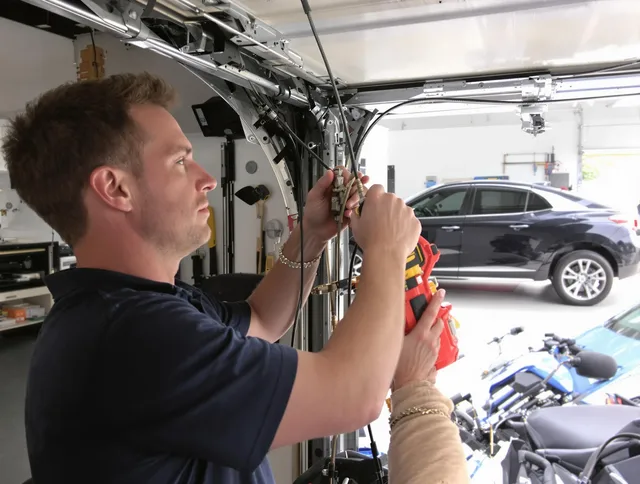 San Juan Capistrano Garage Door Repair safety certified technician performing cable replacement in San Juan Capistrano