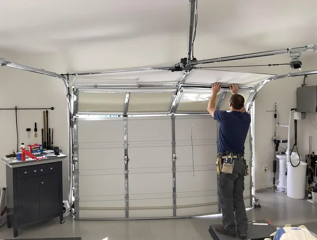 San Juan Capistrano Garage Door Repair specialist performing precise section replacement on San Juan Capistrano garage door